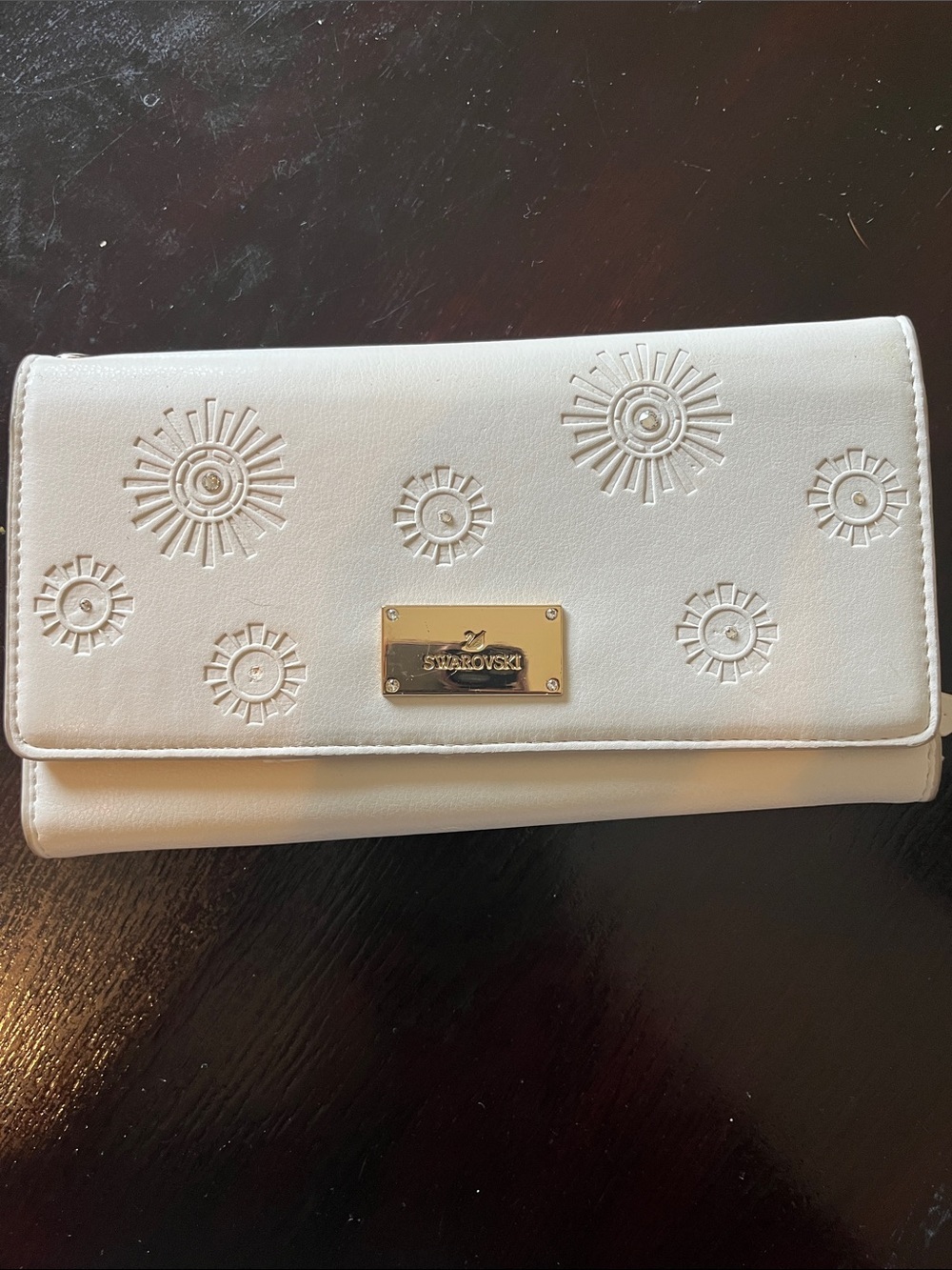 Swarovski White Embossed Sunburst Continental Wallet with Gold Plaque